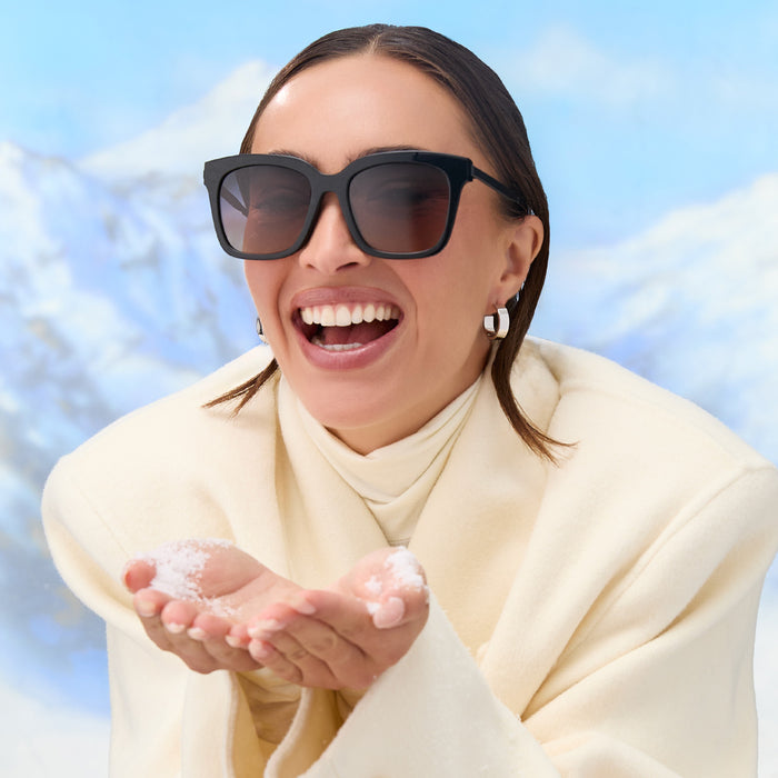 on model - female wearing diff eyewear featuring the bella square sunglasses with a black acetate frame and twilight gradient polarized lenses front view