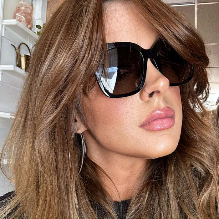 UGC - customer content - musicmellie wearing diff eyewear featuring the bella square sunglasses with a black acetate frame and twilight gradient polarized lenses