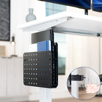 Steel Clamp-on Desk Leg Laptop Mount Holder on a white desk with a blurred office background