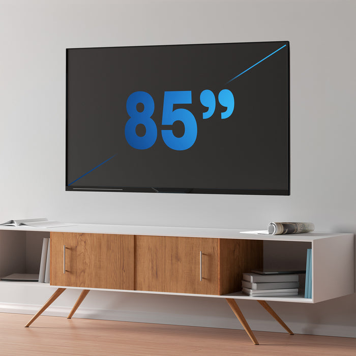 Large TV screen displaying text, mounted on a wall above a wooden entertainment console.