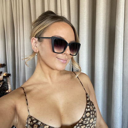 on model - Lauren Kawano - wearing the DIFF Eyewear Sunglasses Heidi Matte Black with Grey Gradient