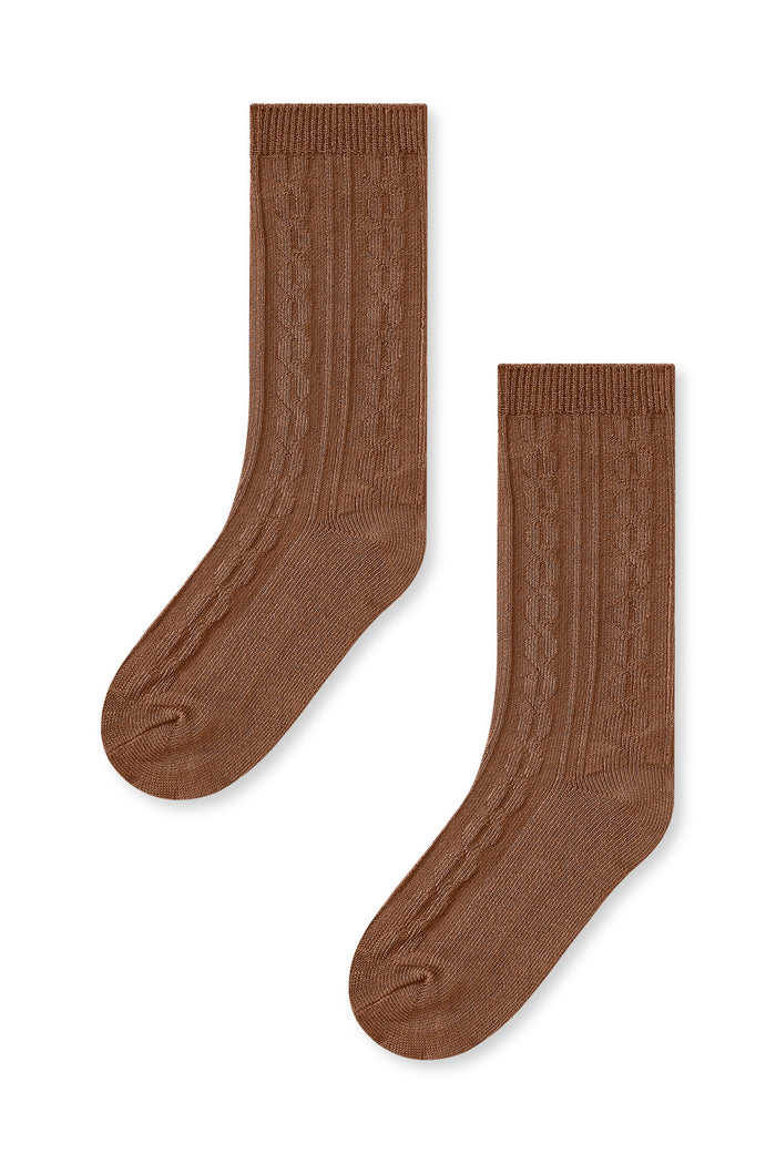 Knee high socks in latte laying flat on a white background.