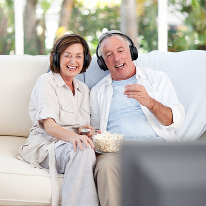 Opera Wireless TV Headphones with transmitter and charging dock, ideal for seniors, providing louder listening volume than standard headphones.