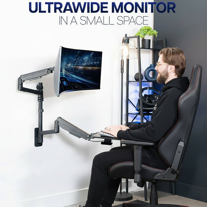 Person using an ultrawide monitor setup with adjustable arms and an adjustable keyboard tray in a modern room.