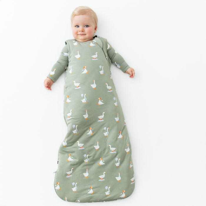 Infant wearing Sleep Bag in Silly Goose 2.5 with long sleeve pajamas