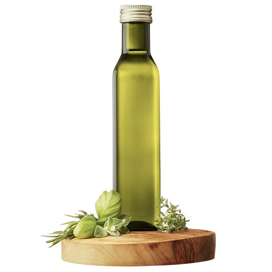 A tall, slender bottle of Tuscan Herb Extra Virgin Olive Oil on a wooden platform, flanked by fresh herbs.